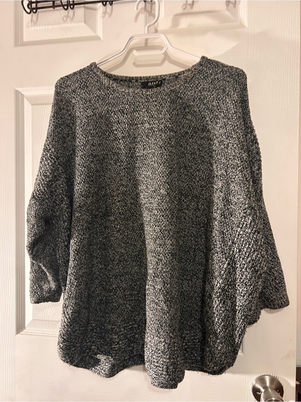 A.N.A.  Black & White Marled Crewneck Sweater here
